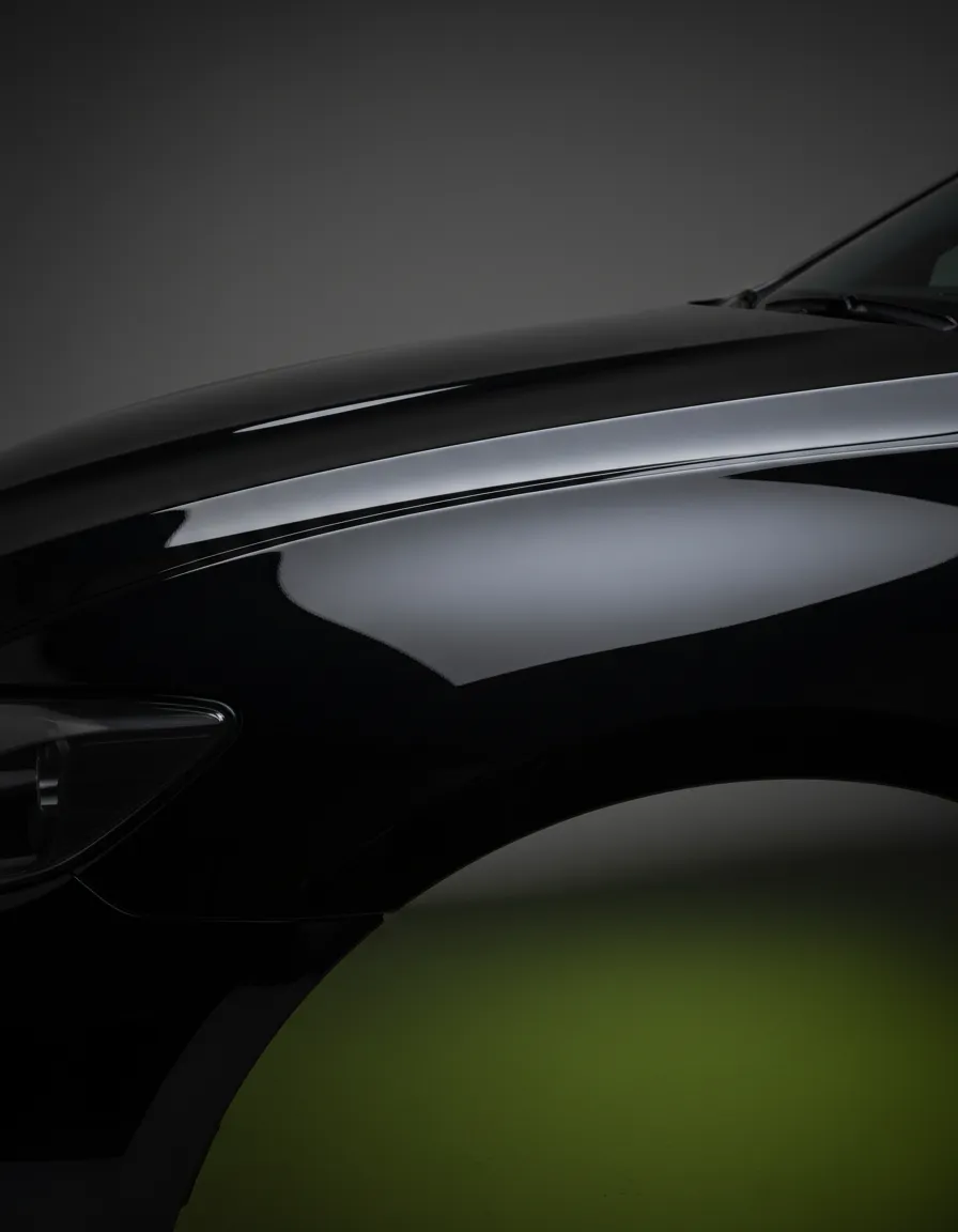Detailed view of high gloss polished car paint with perfect reflections