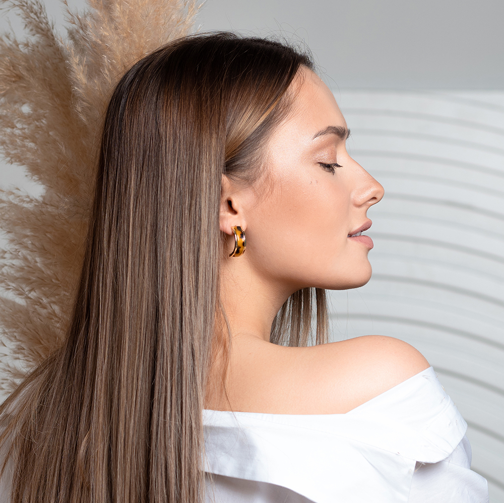 Profile of woman with earring