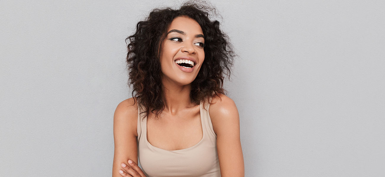 Happy woman looking up