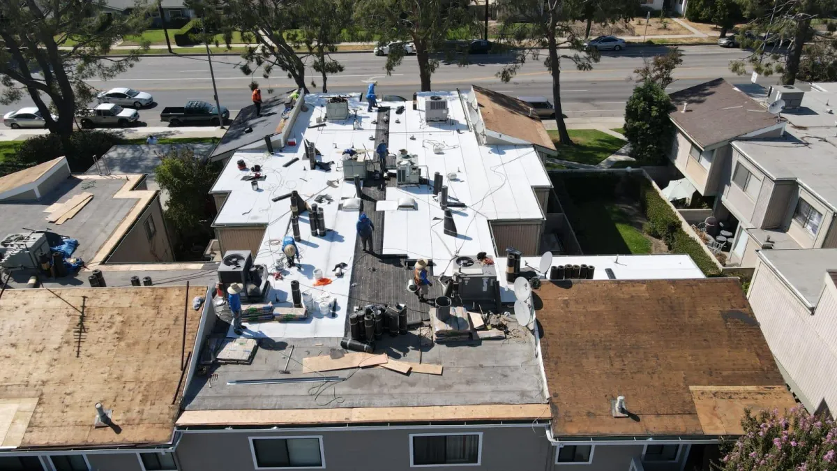 Apartment Building During Roof Restoration