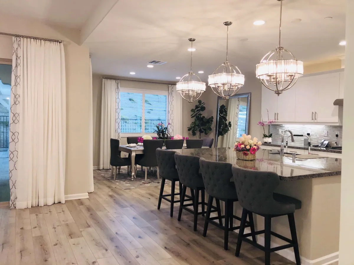 A beautifully designed living room featuring a vibrant mix of colors and patterns, showcasing how coordinated hues and designs can create a harmonious and personalized space.