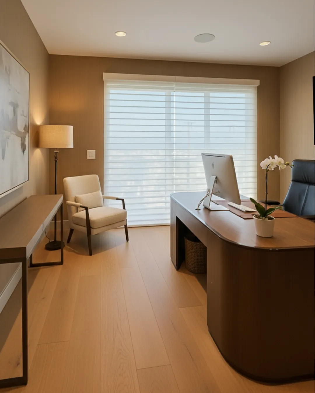 Modern living space with warm ambient lighting and sheer drapery filtering natural light to create a balanced, inviting atmosphere