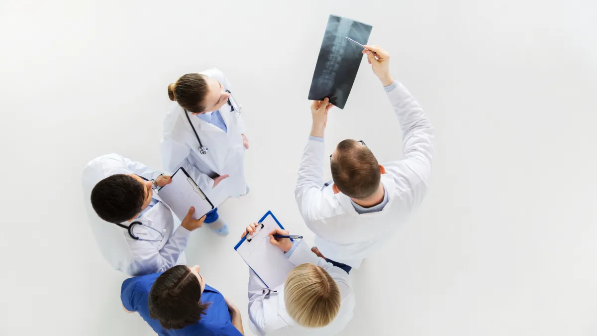Expert spine surgeon providing lower back pain management through advanced spine surgery Plano TX