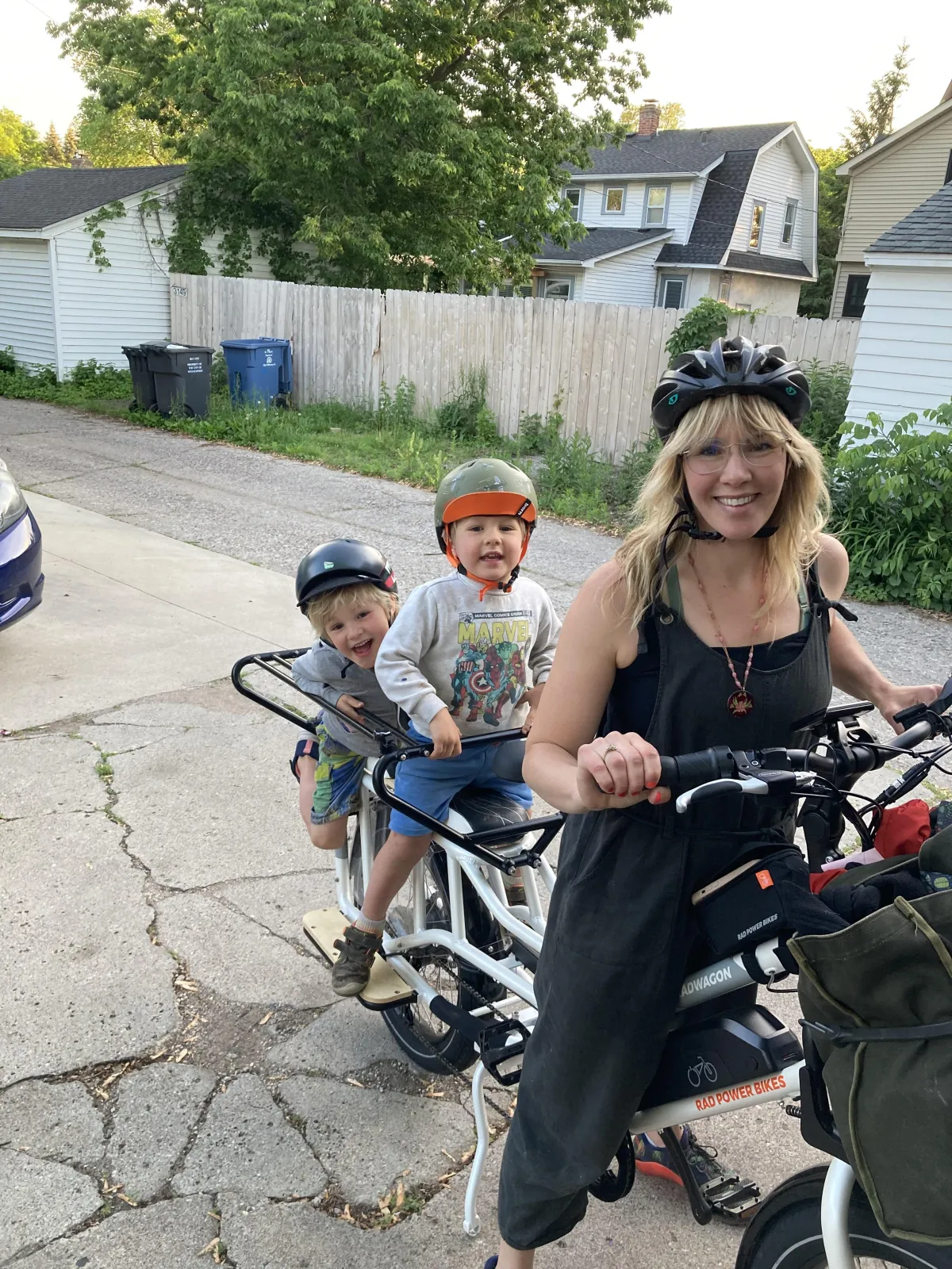 Solcana athlete Lisa Priest and her children riding a bike.