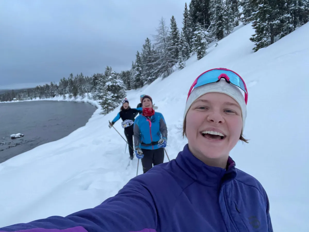 Solcana athlete Molly Horton on a winter hike with their friends.