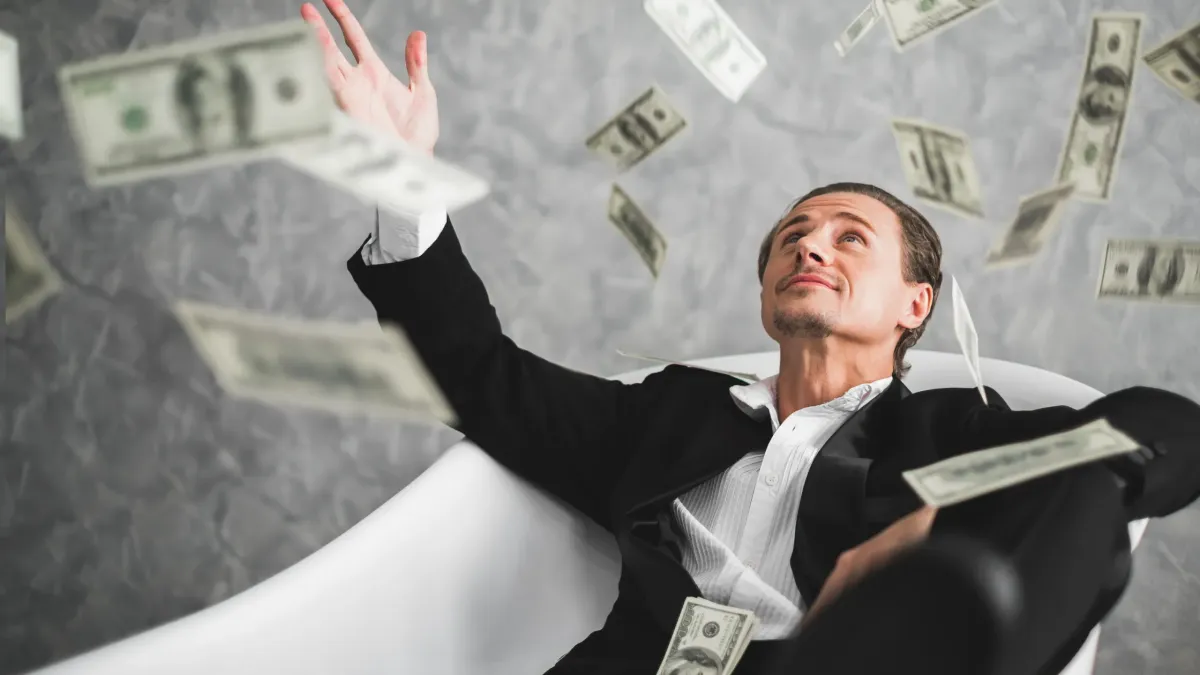 Obsessed Man Throwing Money In The Air