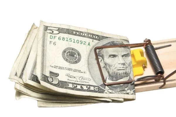 money caught in mouse trap