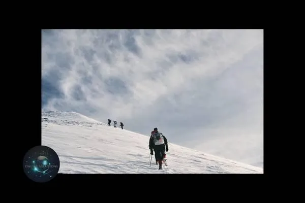 Group of climbers ascending a snowy mountain, symbolizing the importance of reputation management for small businesses in overcoming challenges and achieving success.