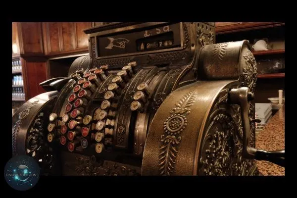 An antique cash register, symbolizing traditional sales methods. This image contrasts with the blog's focus on modern tools like a Web Chat Widget, which automates customer interactions and turns your website into a 24/7 sales machine.