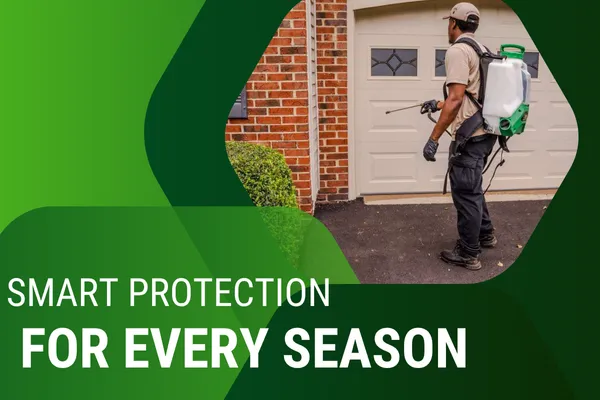 Technician applying pest treatment near a home’s entryway in autumn.