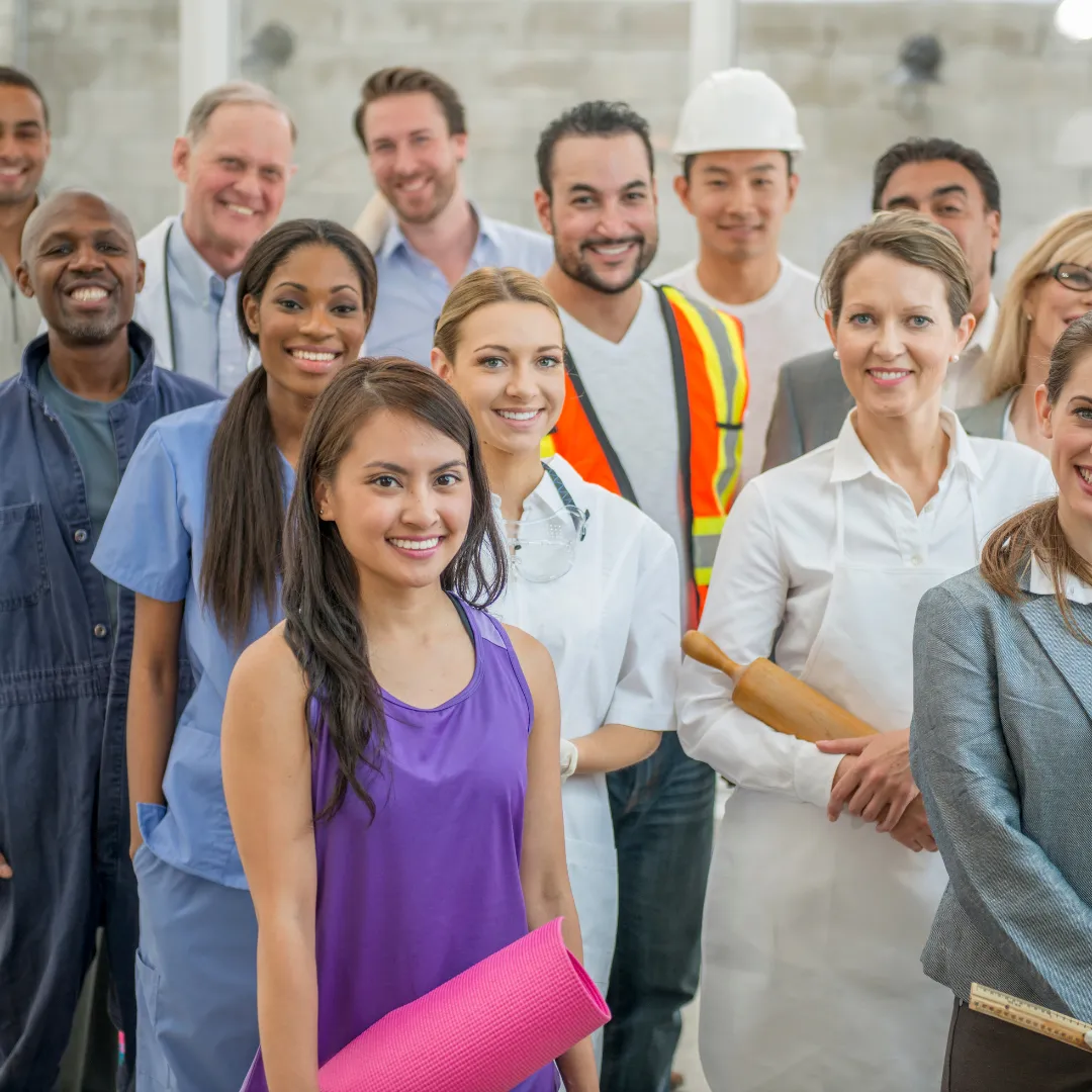 A group of business owners standing next to each other.	