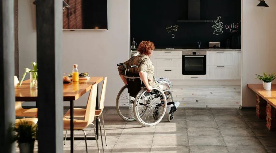 Disabled woman in her kitchen