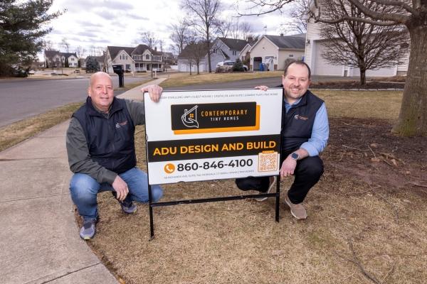 Bob and Breno proudly kneel with the CTH sign