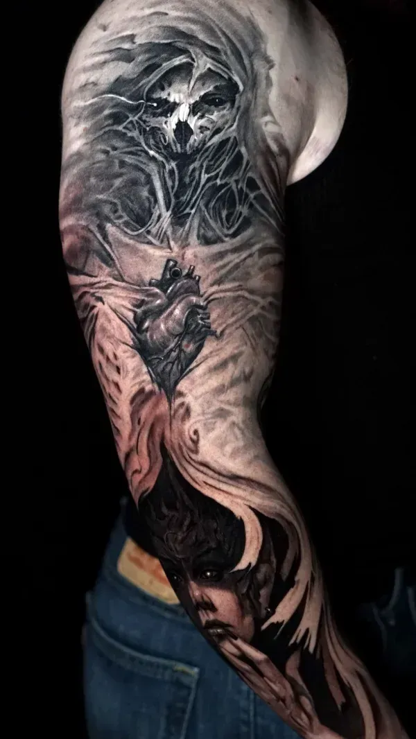 The heart of death black and grey surrealism tattoo: Professional tattoo by James Strickland at Montana Tattoo Company in Missoula, MT 