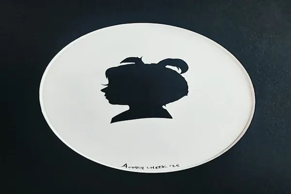 Capturing Moments in Profile: Meet the Silhouette Sisters of Caricature Artists Group