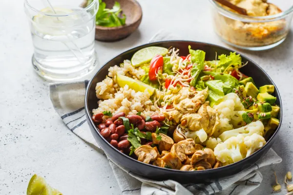 Healthy bowl with vegetables, bean and greens for balanced midlife lunch and blood sugar support