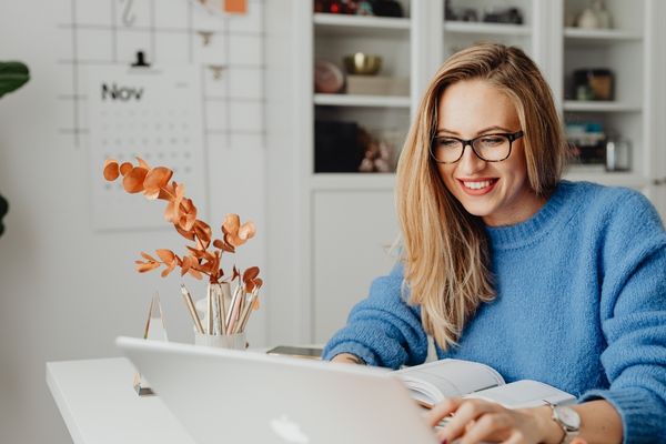 Woman learning about investments on computer
