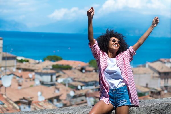 Woman in seaside town celebrating becoming debt free in 90 days