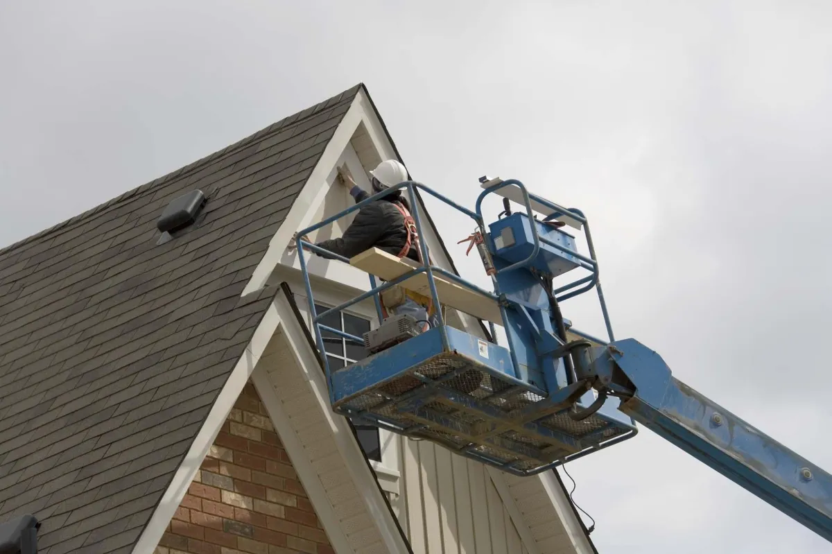 Clean white gutters on a Delaware home, protecting the roof and siding from heavy rain during storm season