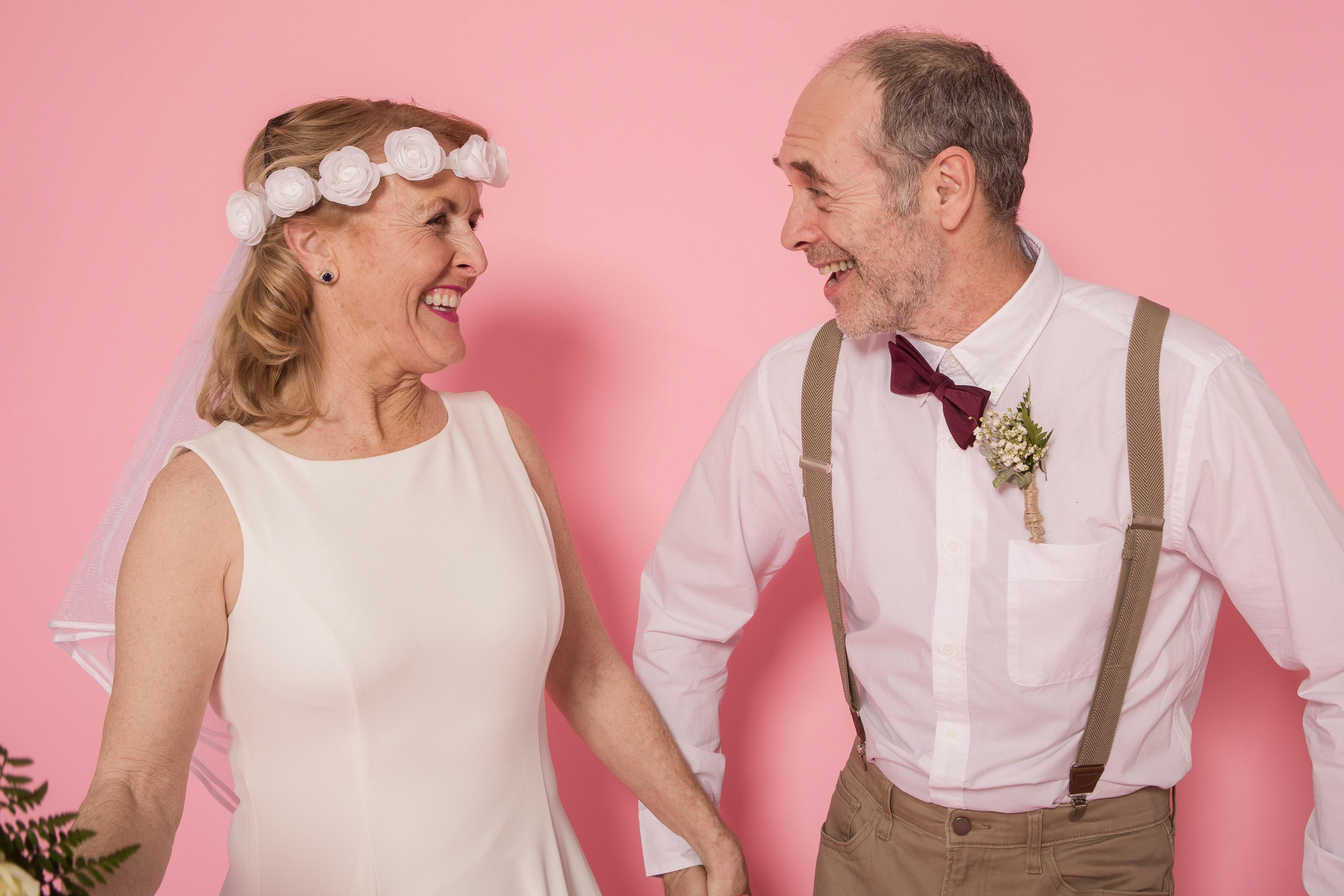 Couple smiling at each other happily