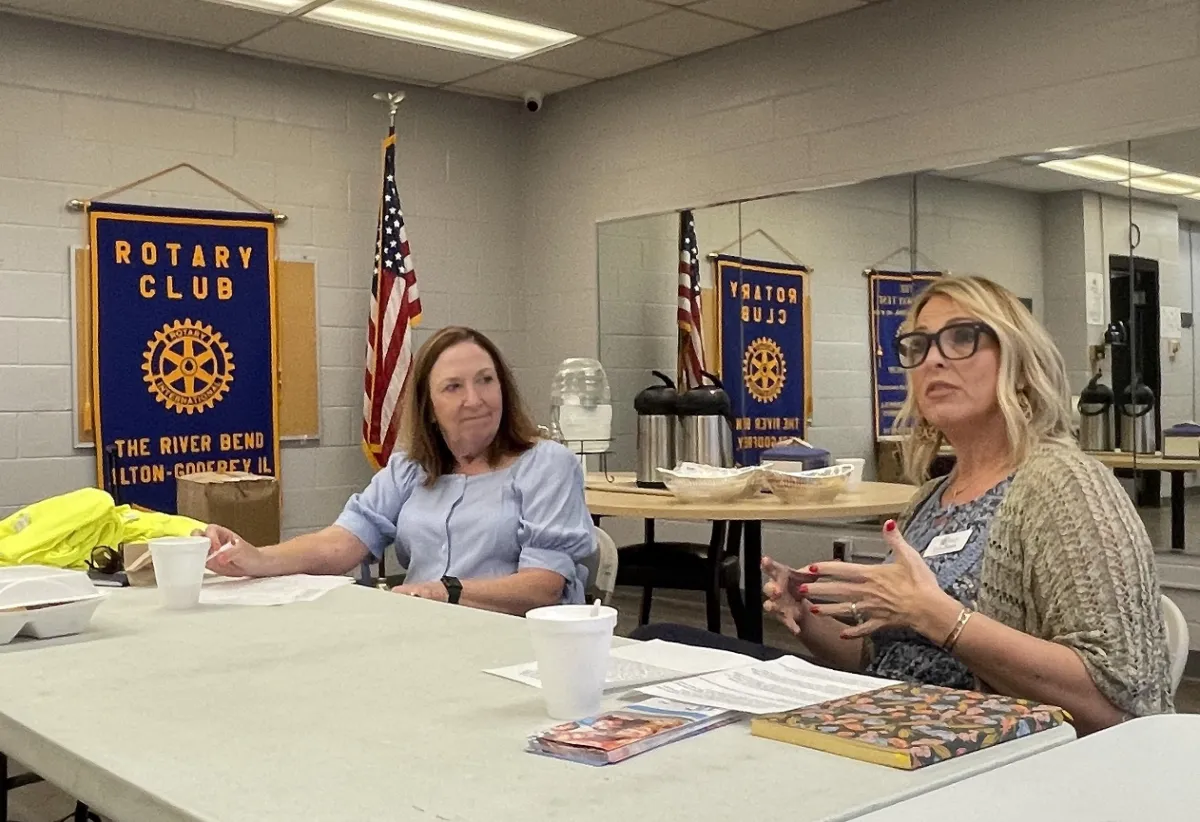 Executive Director of YWCA and Rotarian Dorothy Hummel stands alongside Erin Bickle, Executive Director of Refuge For Kids, after a thought-provoking presentation on foster care and early intervention at a recent Riverbend Rotary Club meeting.