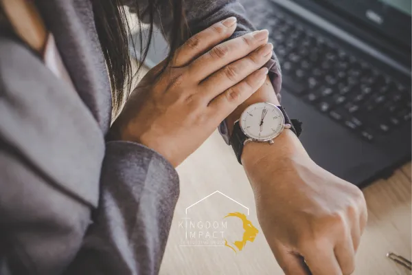 Woman Looking at Wristwatch