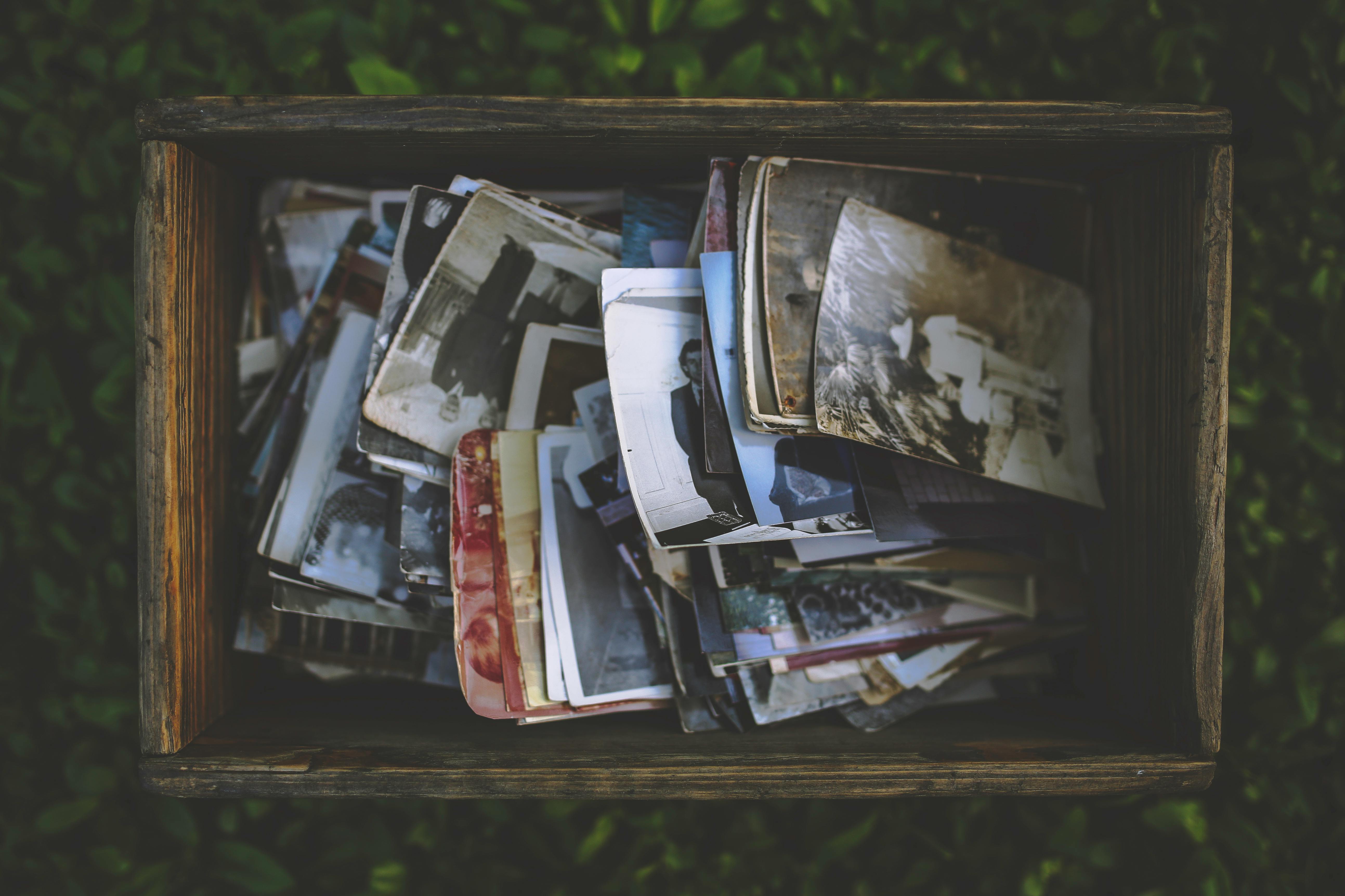 Old photos in the wooden box | Photo by Karola G