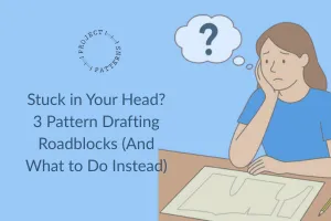 Lady sat at a desk feeling stuck
