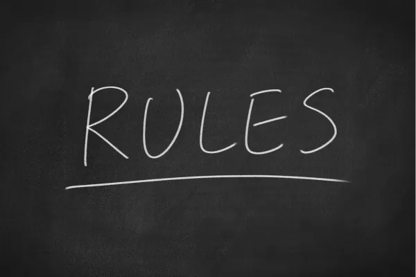 blackboard with rules scribbled on