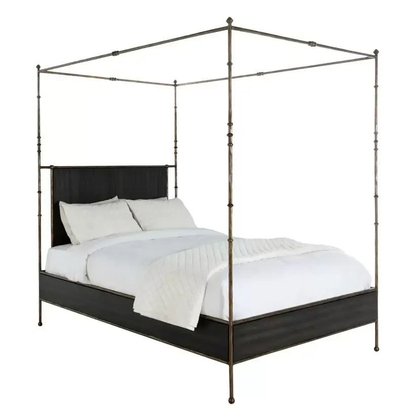 the Reese King Bed brings a striking combination of dark wood and forged metal into a modern canopy design.