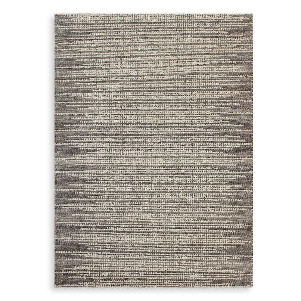 This hand woven Salida rug features natural undyed gray wool with looped ivory raised details.