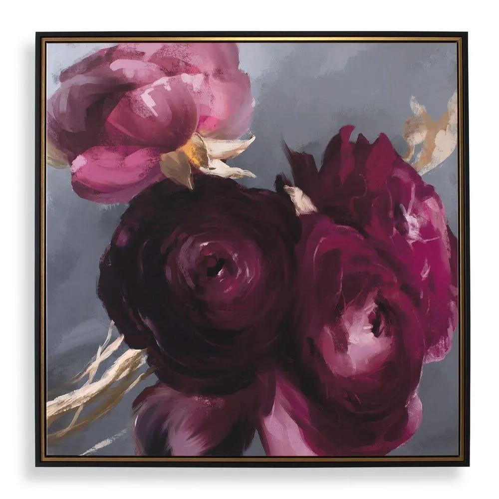 Plum Ranculus Framed Canvas features the velvety petals in deep plum with hints of pink rest against a soft, smoky gray backdrop while accents of pale gold and green add depth and dimension to the floral composition
