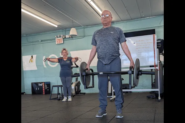 Jorge and Ana doing strength training together