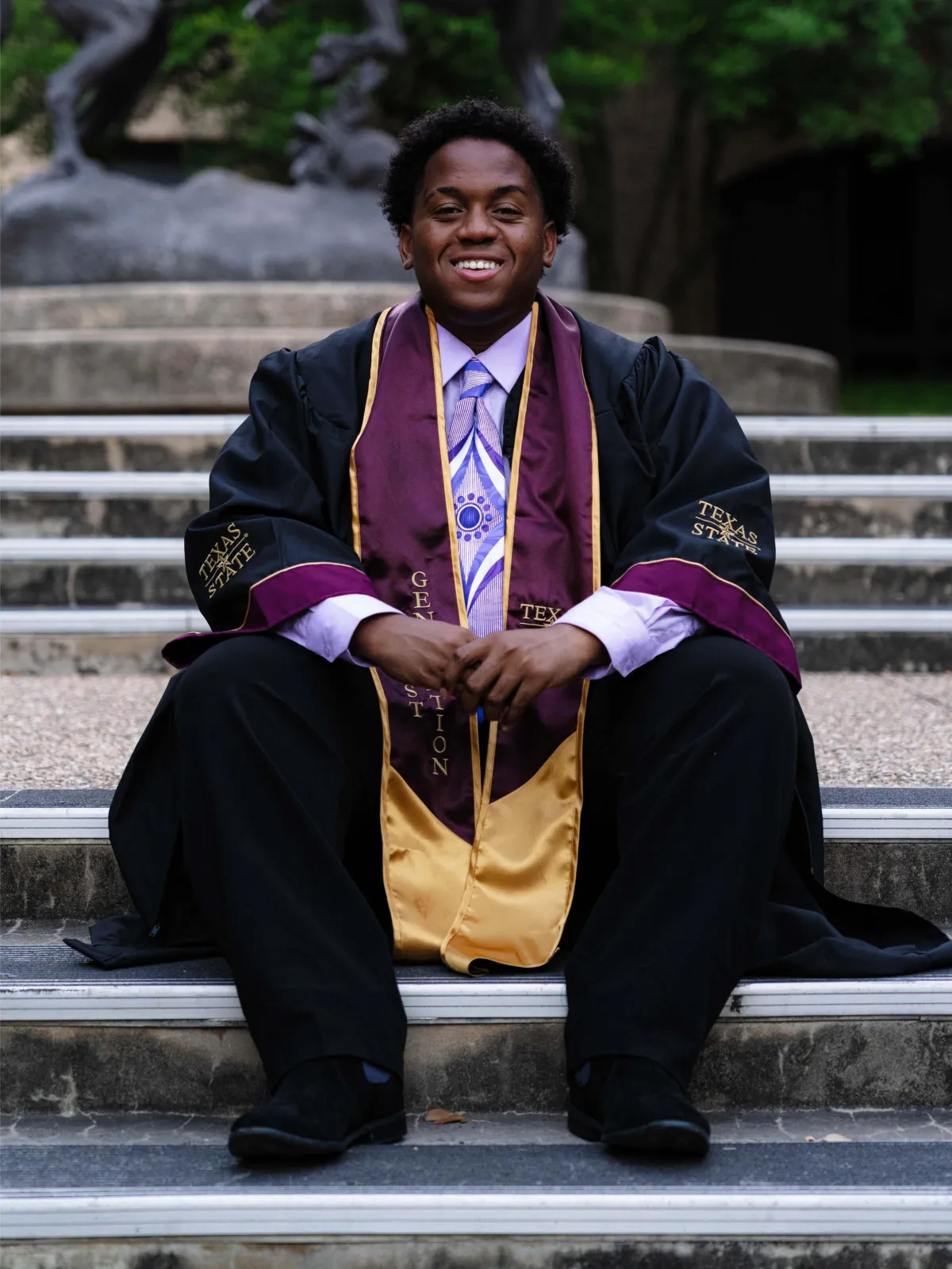 Texas State University graduation portrait, capturing a milestone moment.