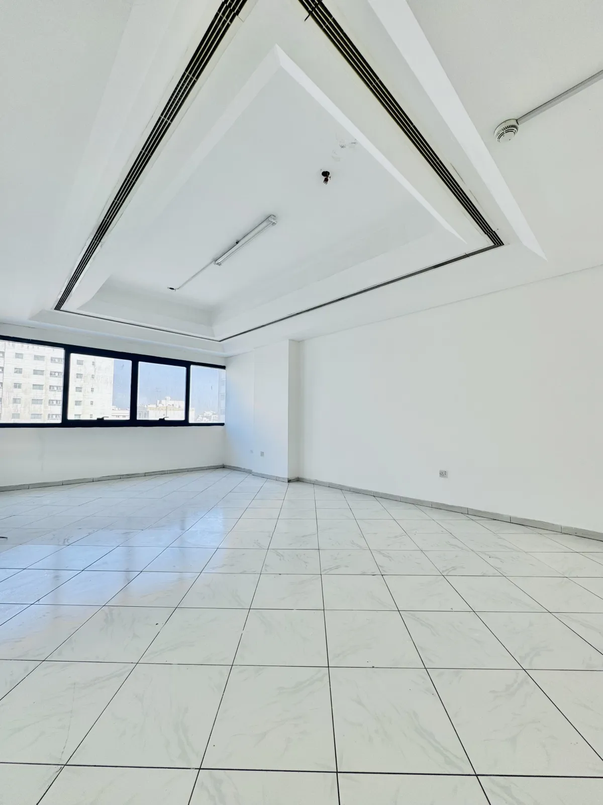 An image of the hall in the 2 bedroom apt in Al Mubarak Center