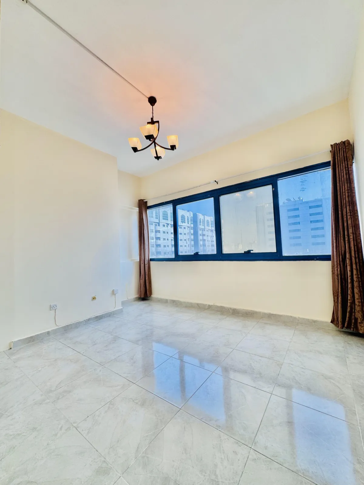 An image of the studio in the 2 bedroom apt in Al Mubarak Center.