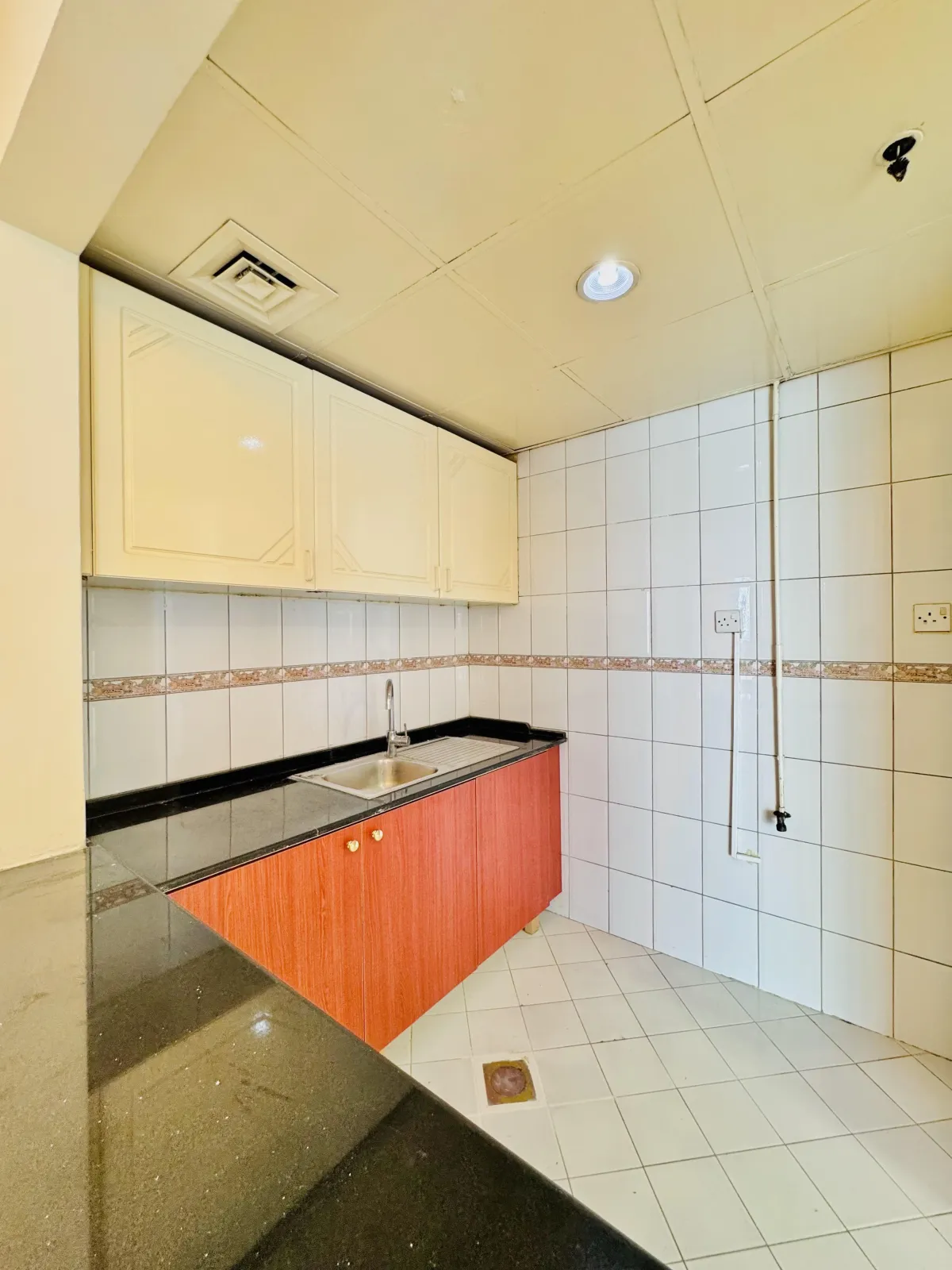 An image of the studio in the 2 bedroom apt in Al Mubarak Center.