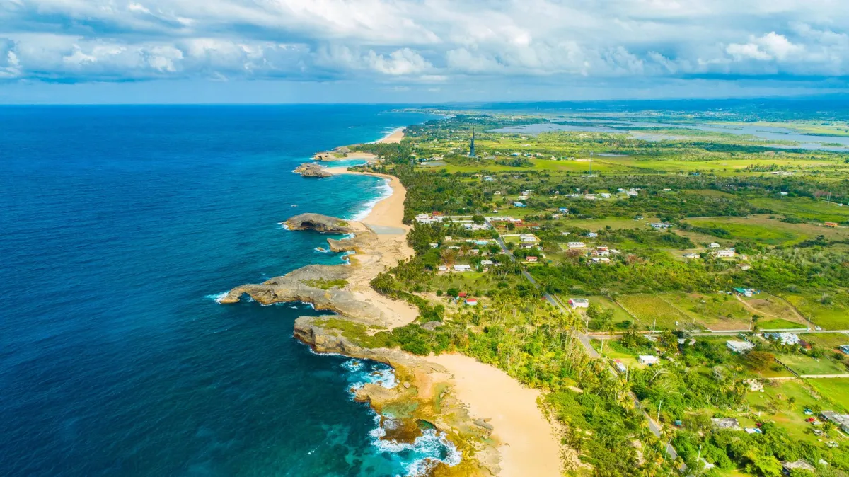 Crystal-clear waters and soft white sand at Boquerón Beach, just 3 miles from Magnolia Inn.