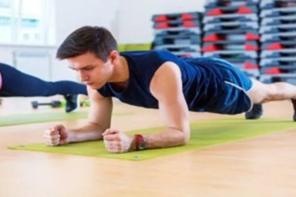 man doing plank exercise