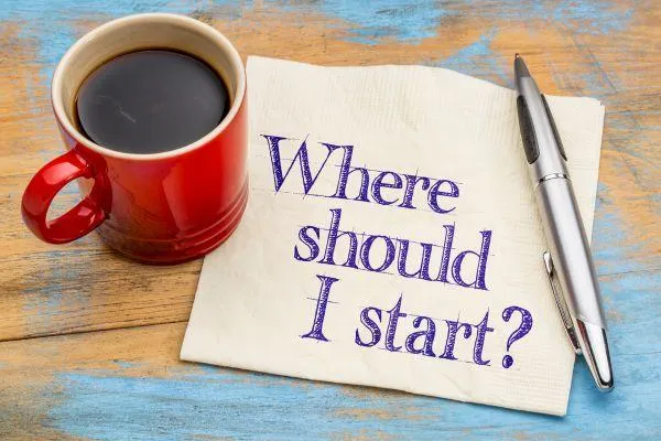 Coffee cup on desk with 'Where should I start?' note, symbolizing Halifax SEO strategy planning.