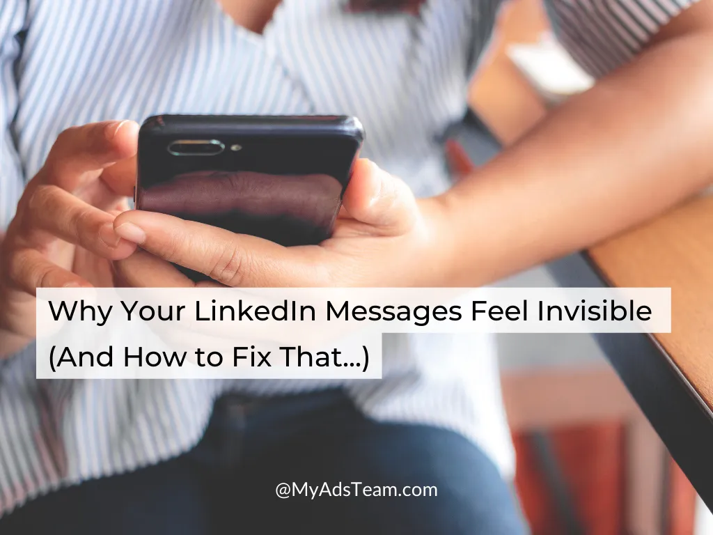 Person holding a smartphone while using LinkedIn, representing challenges with cold outreach messages and how to start real conversations instead.