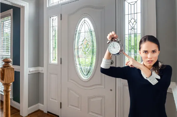 Mother holding clock