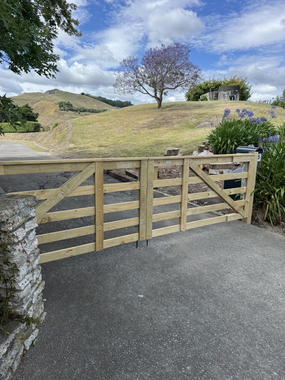Timber driveway gate installed at residential entrance, showcasing general handyman and gate building services in Hawke's Bay by Mitch's Maintenance