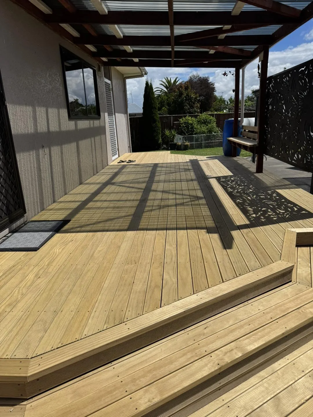 Timber deck with covered pergola attached to home, highlighting deck building and pergola construction services in Hawke's Bay by Mitch's Maintenance
