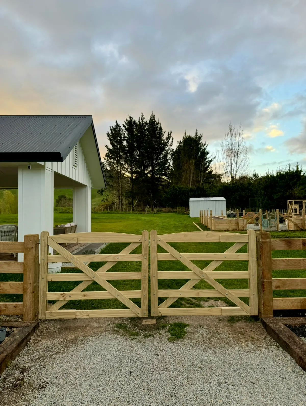 Double timber driveway gate installed at rural property, highlighting general handyman and gate installation services in Hastings, Hawke's Bay by Mitch's Maintenance