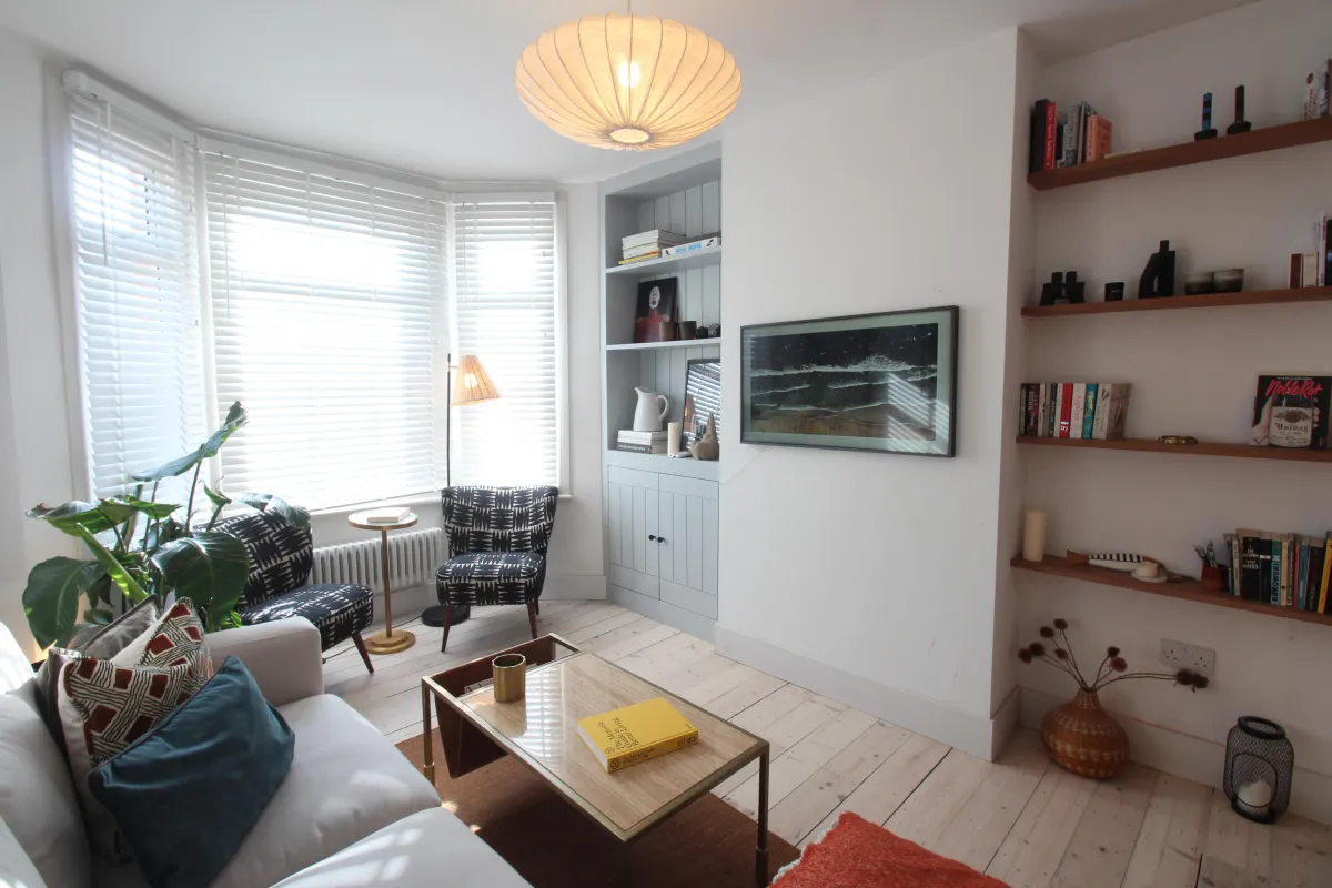 a modern built in sitting room set up made bespoke from wood