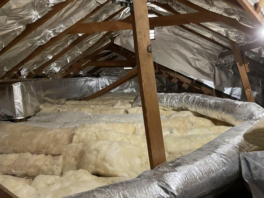 Attic Insulation Contractor Installing Insulation In Las Vegas Attic