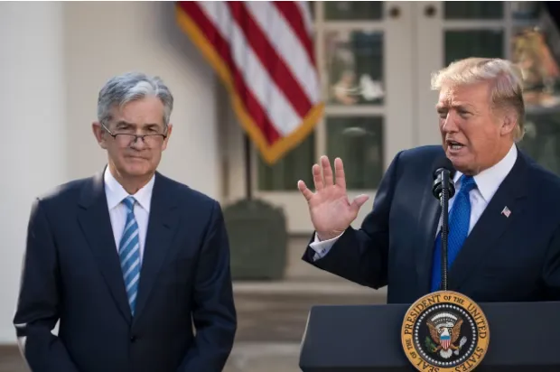 President Trump and Jerome Powell at a press conference