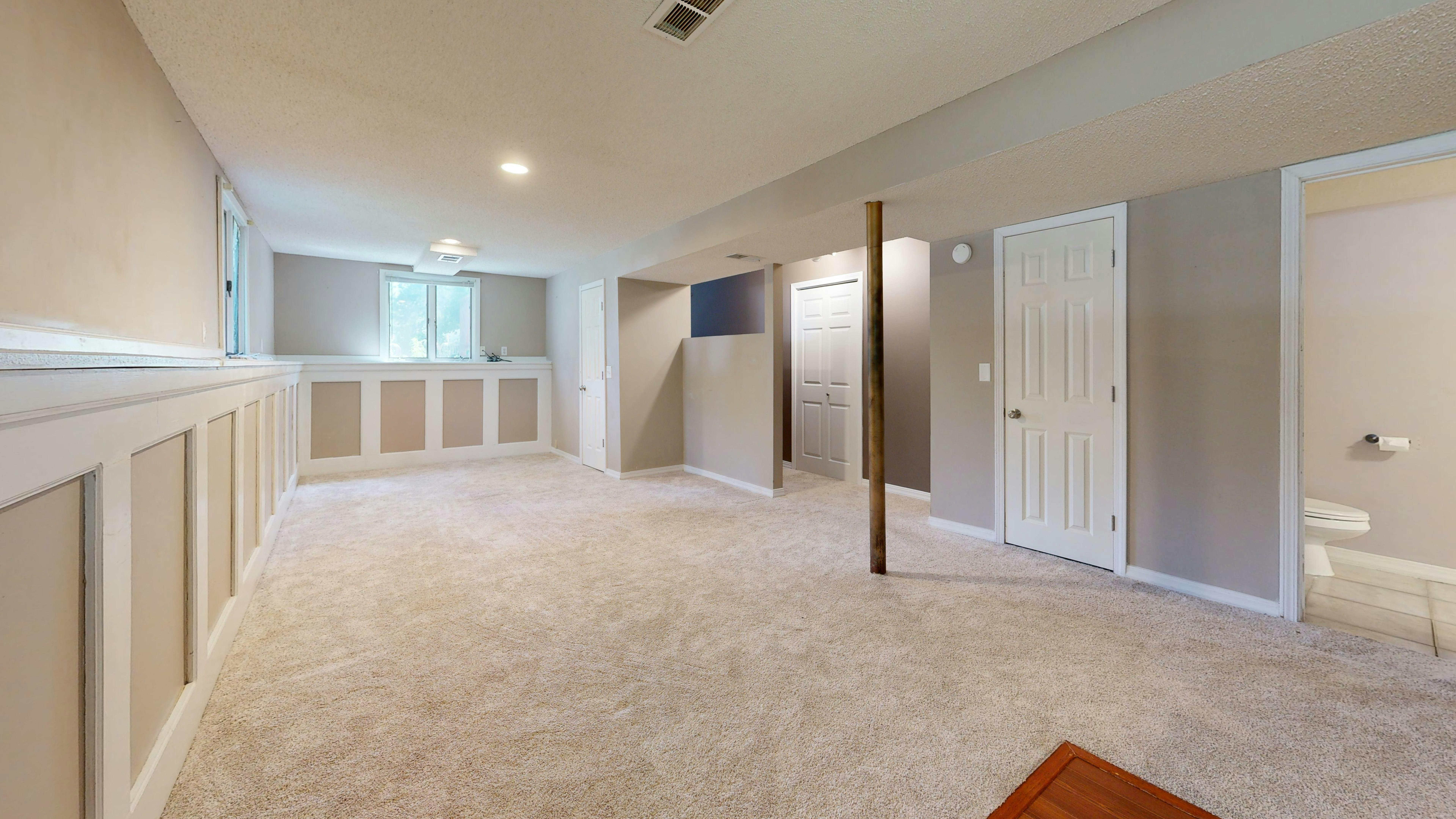 Open concept basement living room space