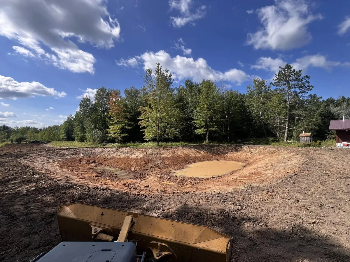 Digging a pond in central wisconsin